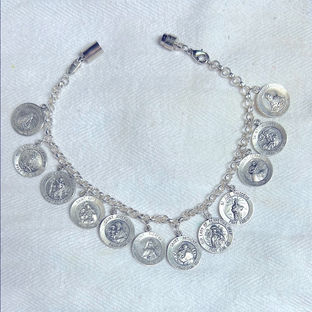 Silver Charm Bracelet with 12 saints on round charms Vintage Design 7.5”